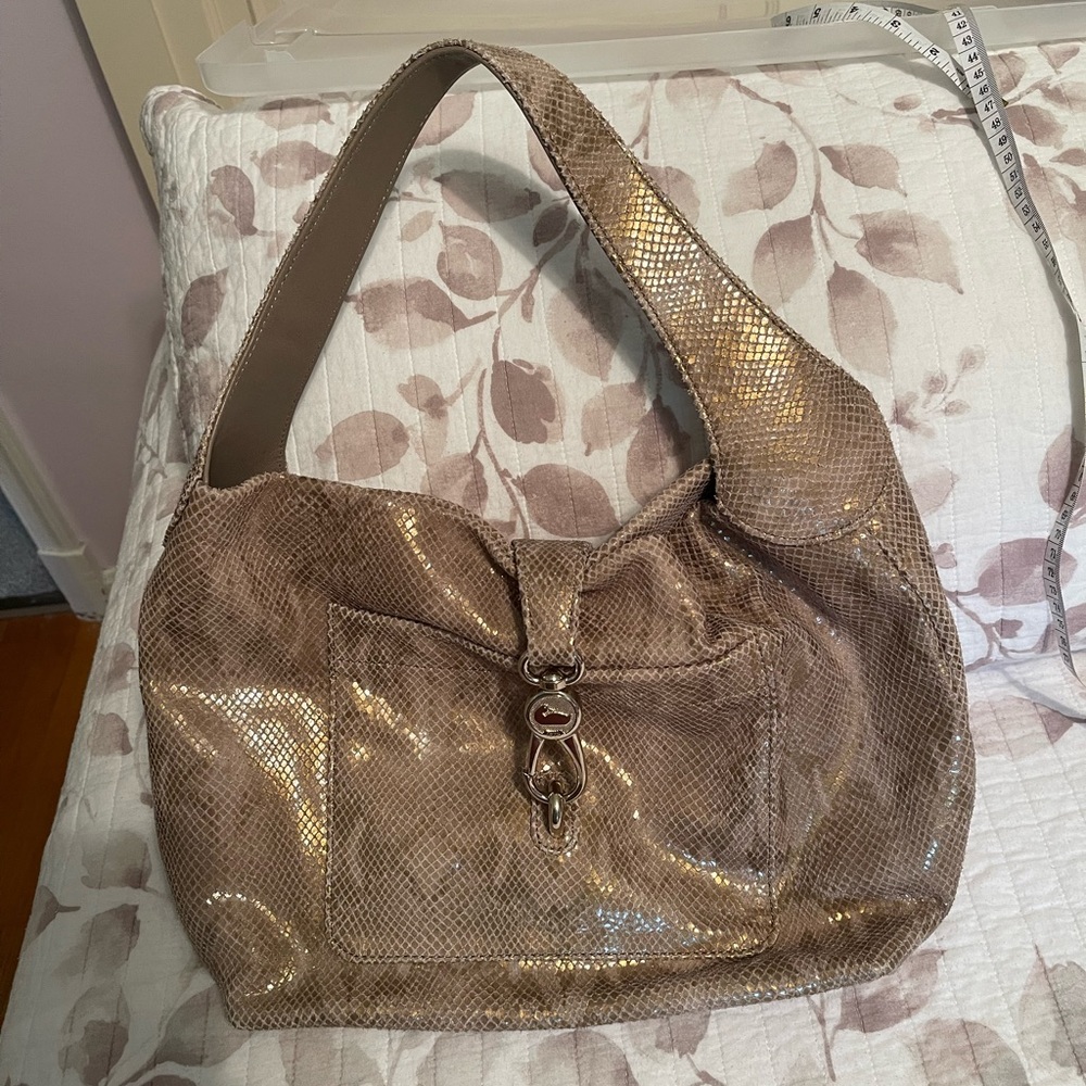 MAKE AN OFFER. 
Dooney and Bourke Handbag